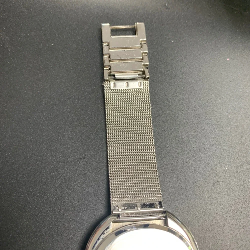Chuangang Women Quartz‎ Watch Silver Mesh Band Oval Black Star Dial 114